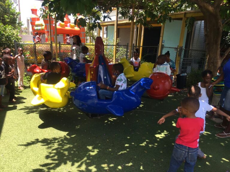 Kids smiling at a WildRides fun day